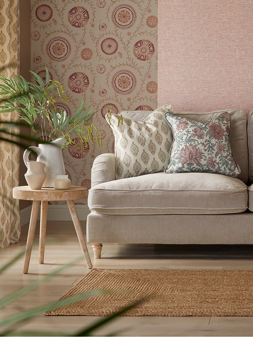 Folk Tale block-print wallpaper and cushions in a living room