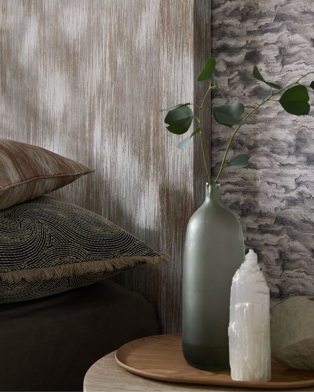 Elemental textured wallpaper in a mineral-toned bedroom